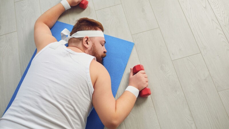 person feeling frustrated while trying to lose fat and build healthier habits